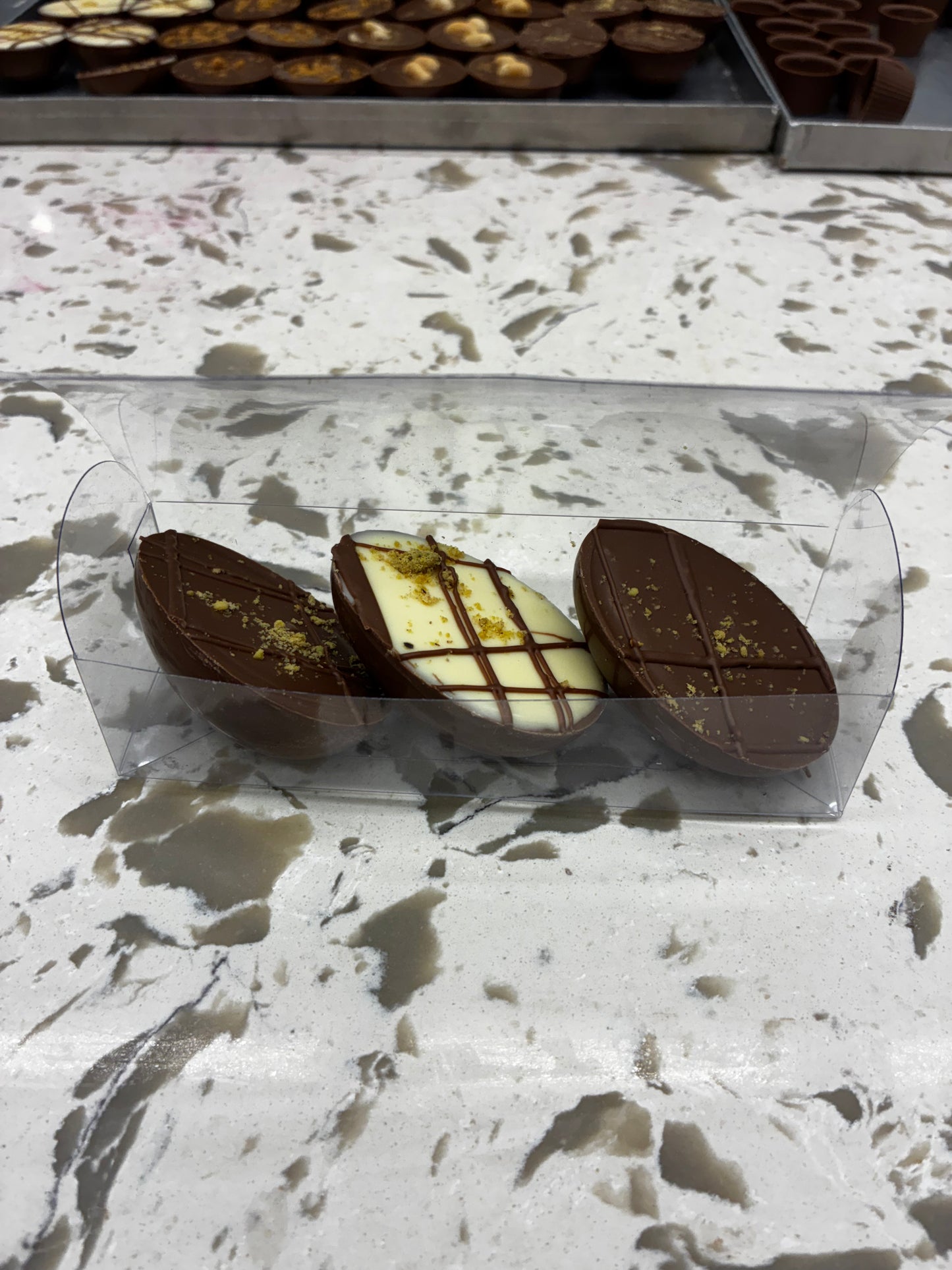 Pistachio, Peanut Butter or Biscoff filled half eggs