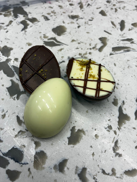 Pistachio, Peanut Butter or Biscoff filled half eggs